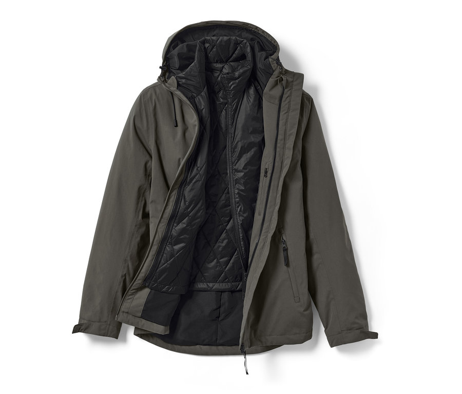 Rozłożona kurtka outdoorowa 3 w 1 z kamizelką, kurtka jest w kolorze oliwkowej zieleni, a kamizelka jest czarna.