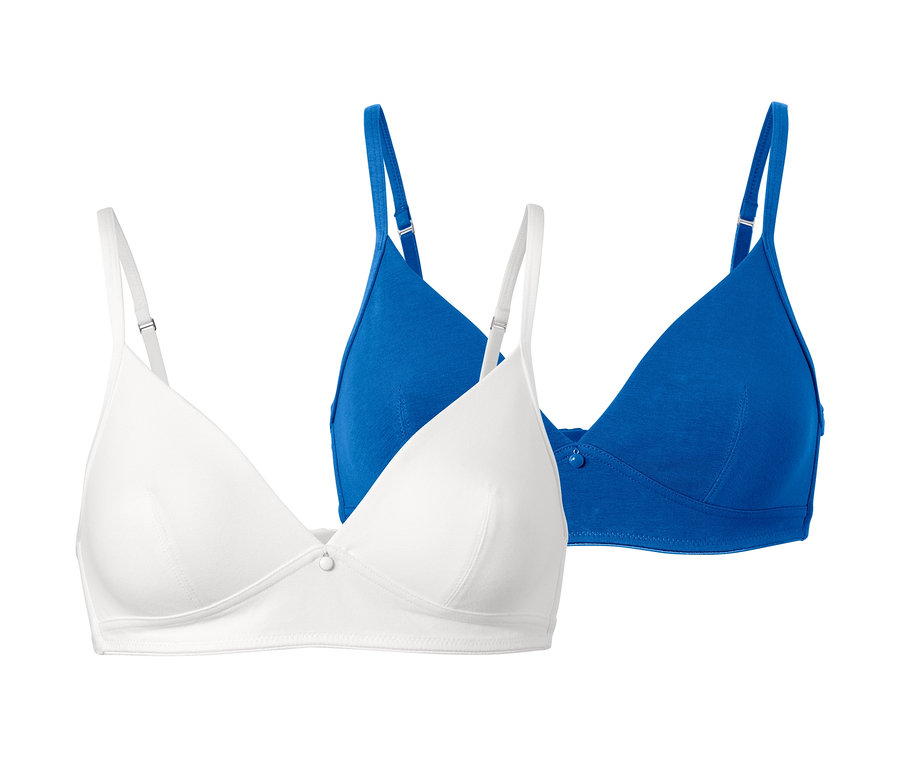 Dwa miękkie biustonosze: biały i niebieski.