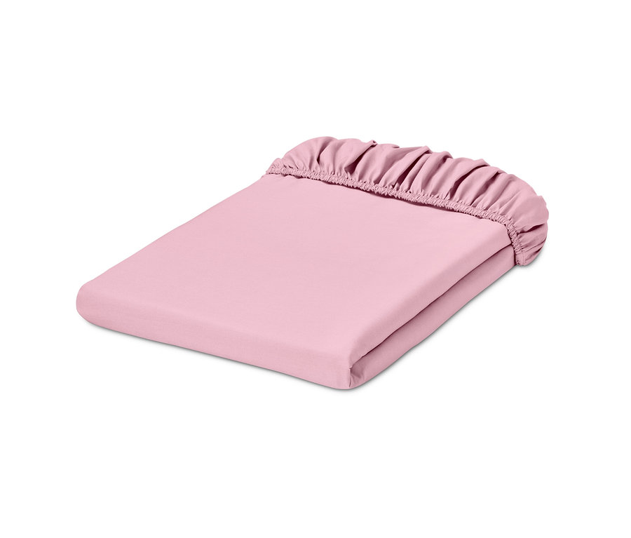 Złożone różowe perkalowe prześcieradło z gumką.