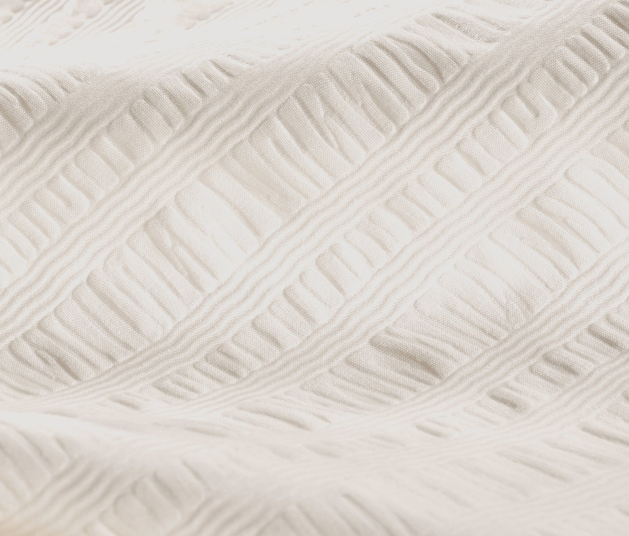 Zbliżenie na pościel z kory w kolorze złamanej bieli, rozmiar standardowy i niestandardowy.