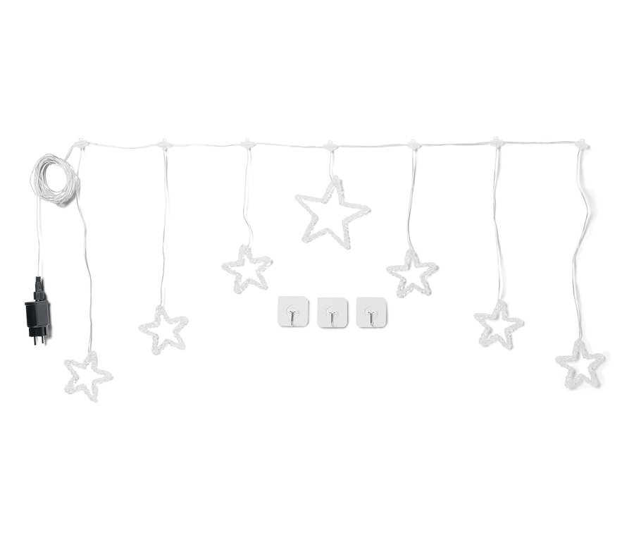 Biały łańcuch świetlny z gwiazdami i trzema uchwytami na kable na białym tle.