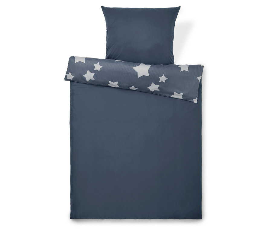 Niebieski zestaw pościeli w gwiazdy z poduszką.