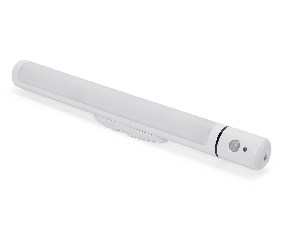 Biała lampa LED z czujnikiem ruchu leży na białej powierzchni.