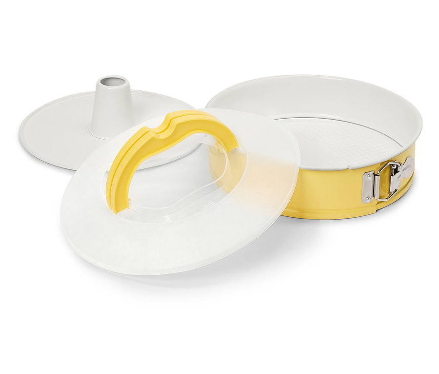 Żółta forma do pieczenia z wyjmowanym dnem i pokrywką.