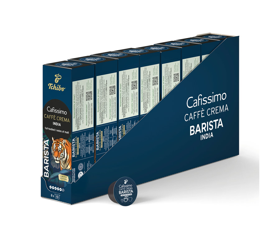Ciemnoniebieskie opakowanie zbiorcze z 80 kapsułkami kawy Cafissimo BARISTA Caffè Crema India, z przodu jedna luzem. Na pudełku wizerunek tygrysa.