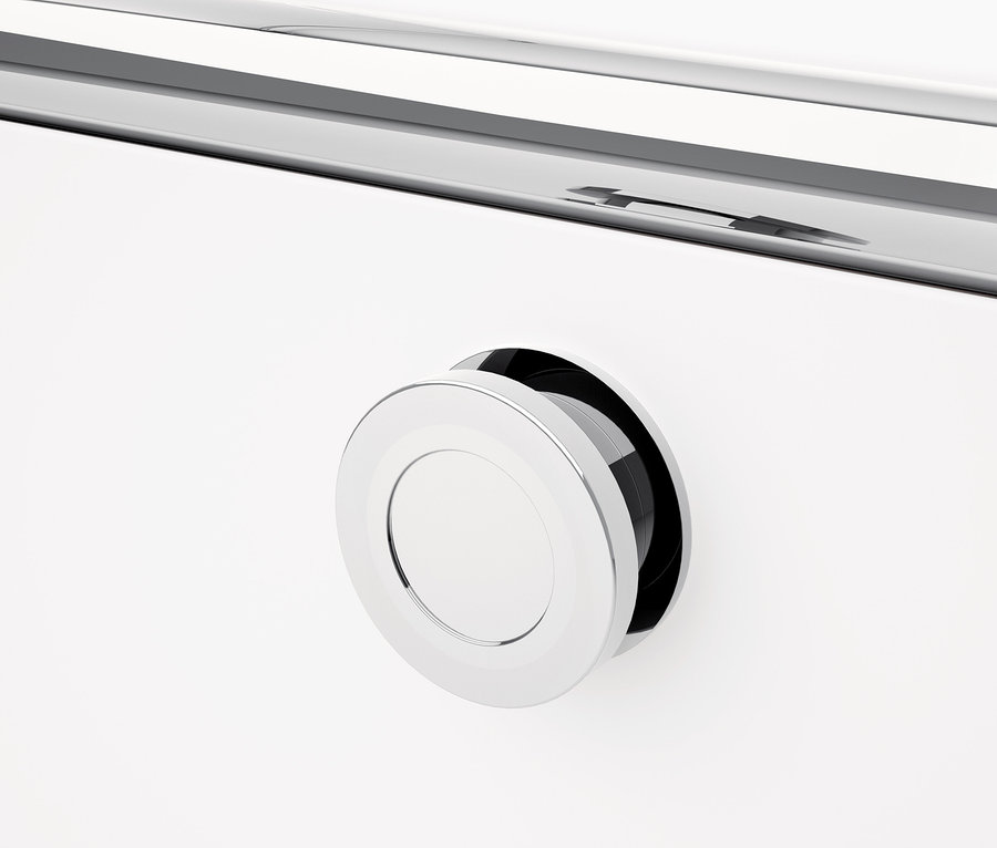 Detal białego metalowego mebla CN3 z okrągłym uchwytem.