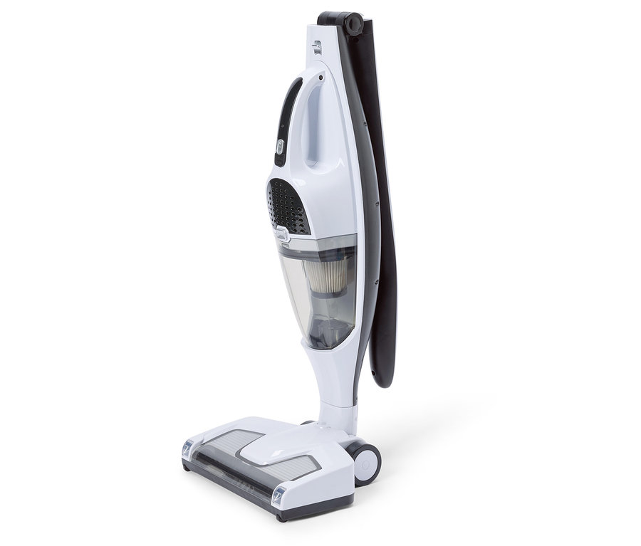 Biały i czarny odkurzacz stoi na białym tle.