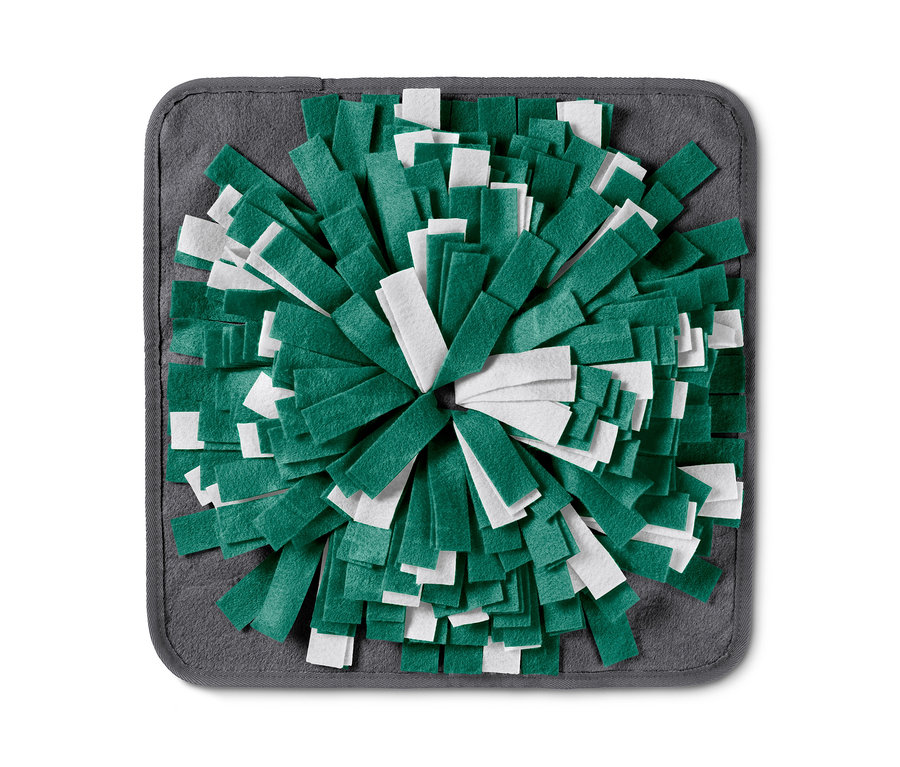 Mata węchowa ze białymi i zielonymi paskami filcu na szarym tle.