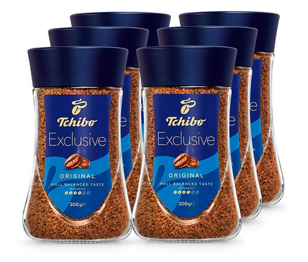 Sześć słoików kawy rozpuszczalnej Tchibo Exclusive 6x200g z niebieską pokrywką.