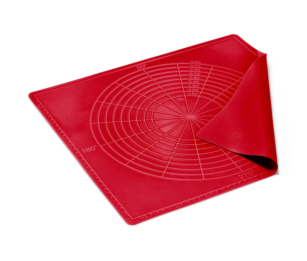 Czerwona mata do pieczenia z okrągłym wzorem i podziałką.