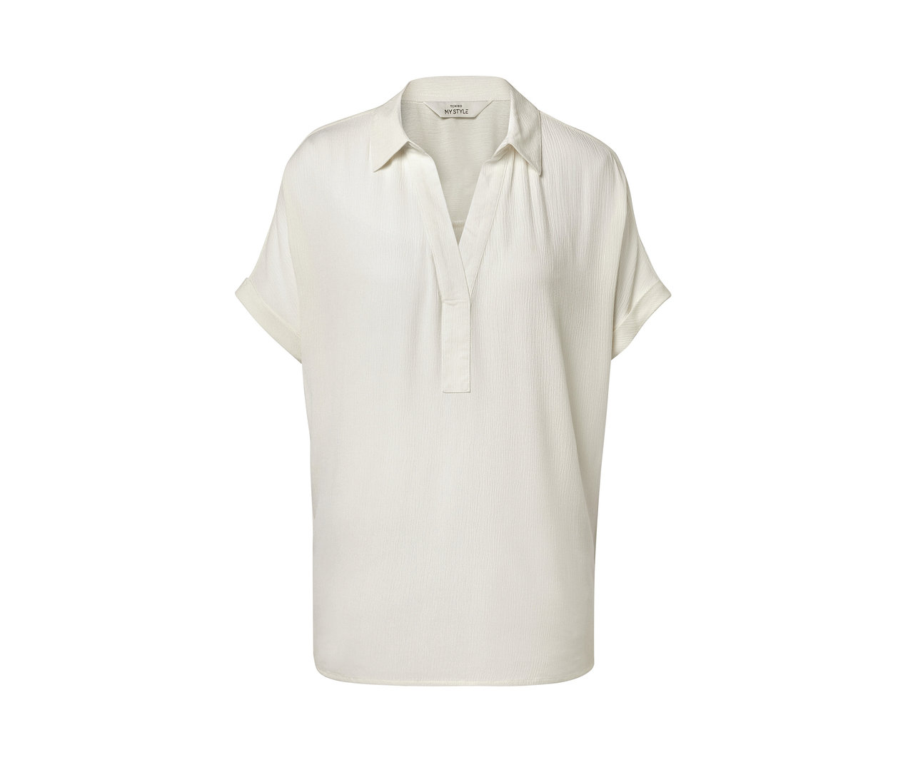 Kremowa bluzka z krótkimi rękawami.