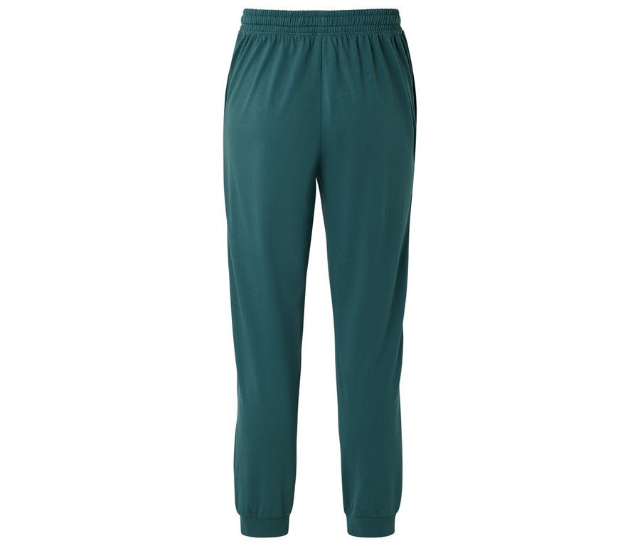 Zielone spodnie dresowe ze ściągaczem w pasie i mankietami na kostkach.
