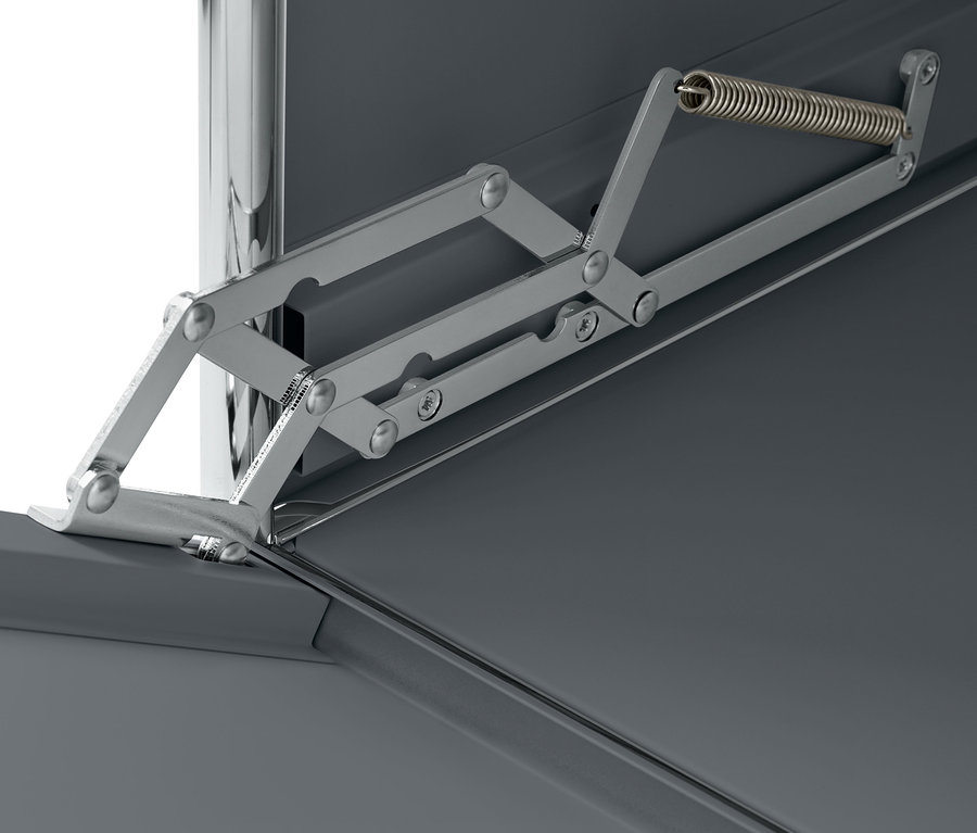 Szczegół metalowego kontenera na kółkach »CN3« z klapą, szarego.