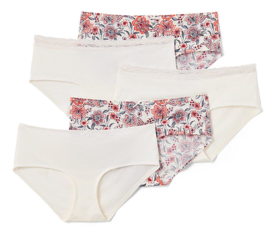 Zbliżenie na pięć par kremowych fig, niektóre z kwiatowym wzorem.