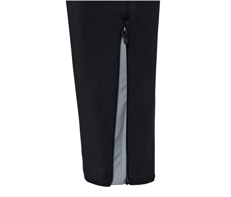 Fragment czarnych profesjonalnych spodni do biegania z srebrnym zamkiem błyskawicznym na nogawce.