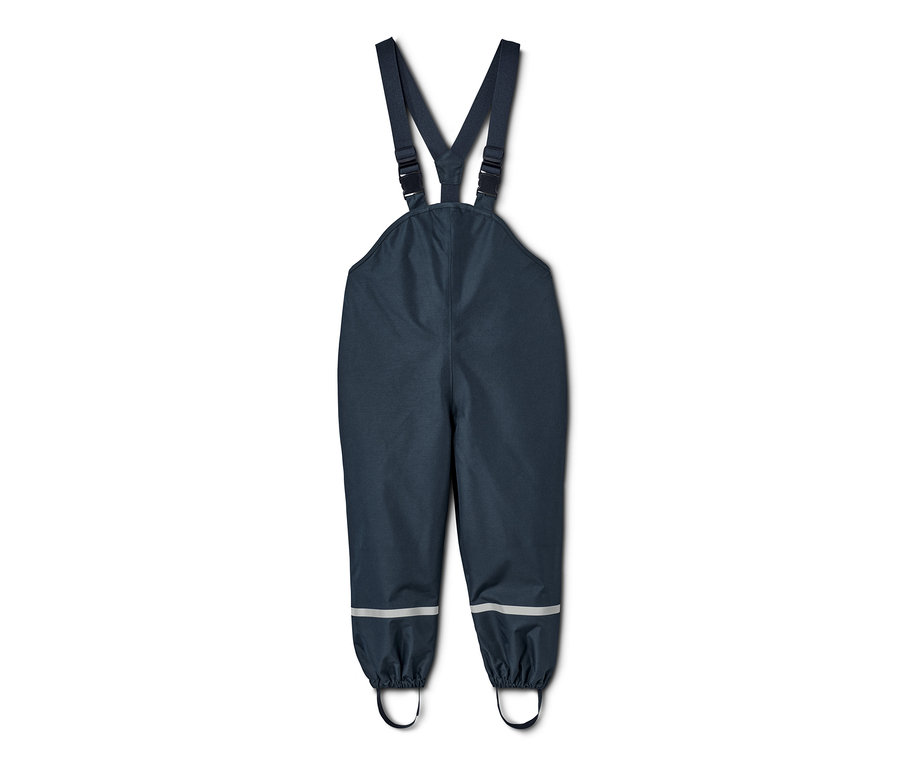 Granatowe spodnie przeciwdeszczowe z materiału z recyklingu ze śliniakiem i regulowanymi ramiączkami.