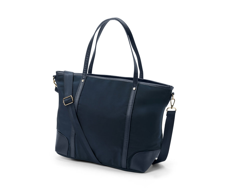 Granatowa torba shopperka z uchwytami i paskiem na ramię.