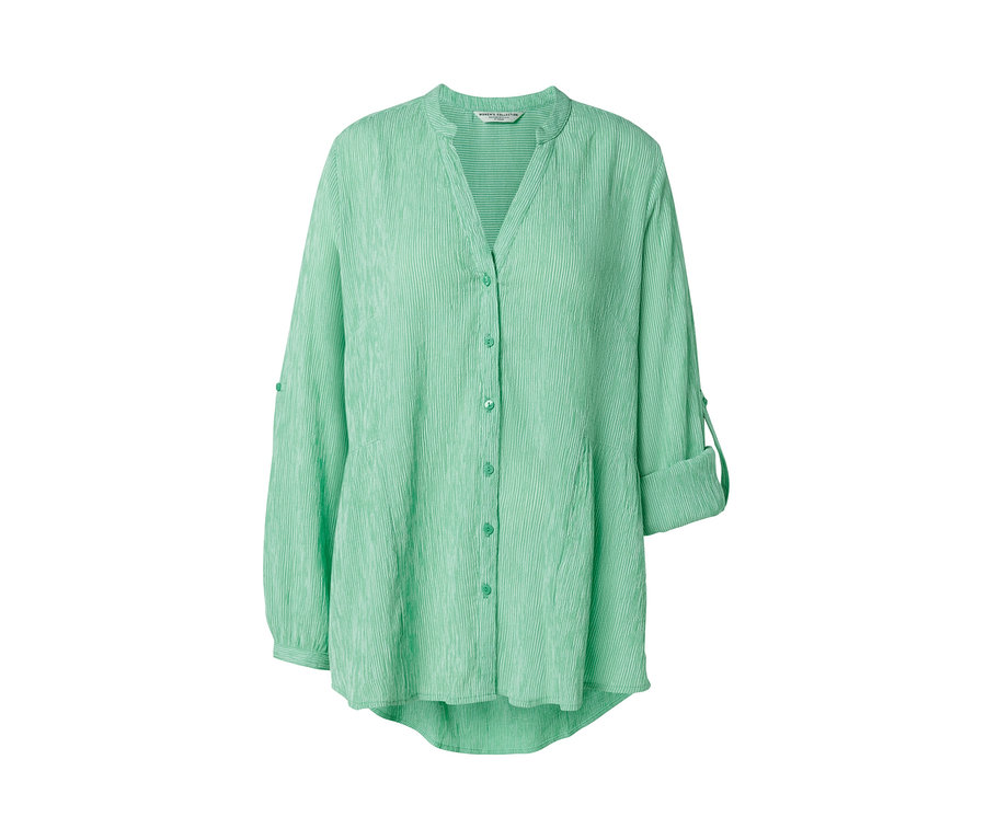 Zielona tunika w paski.