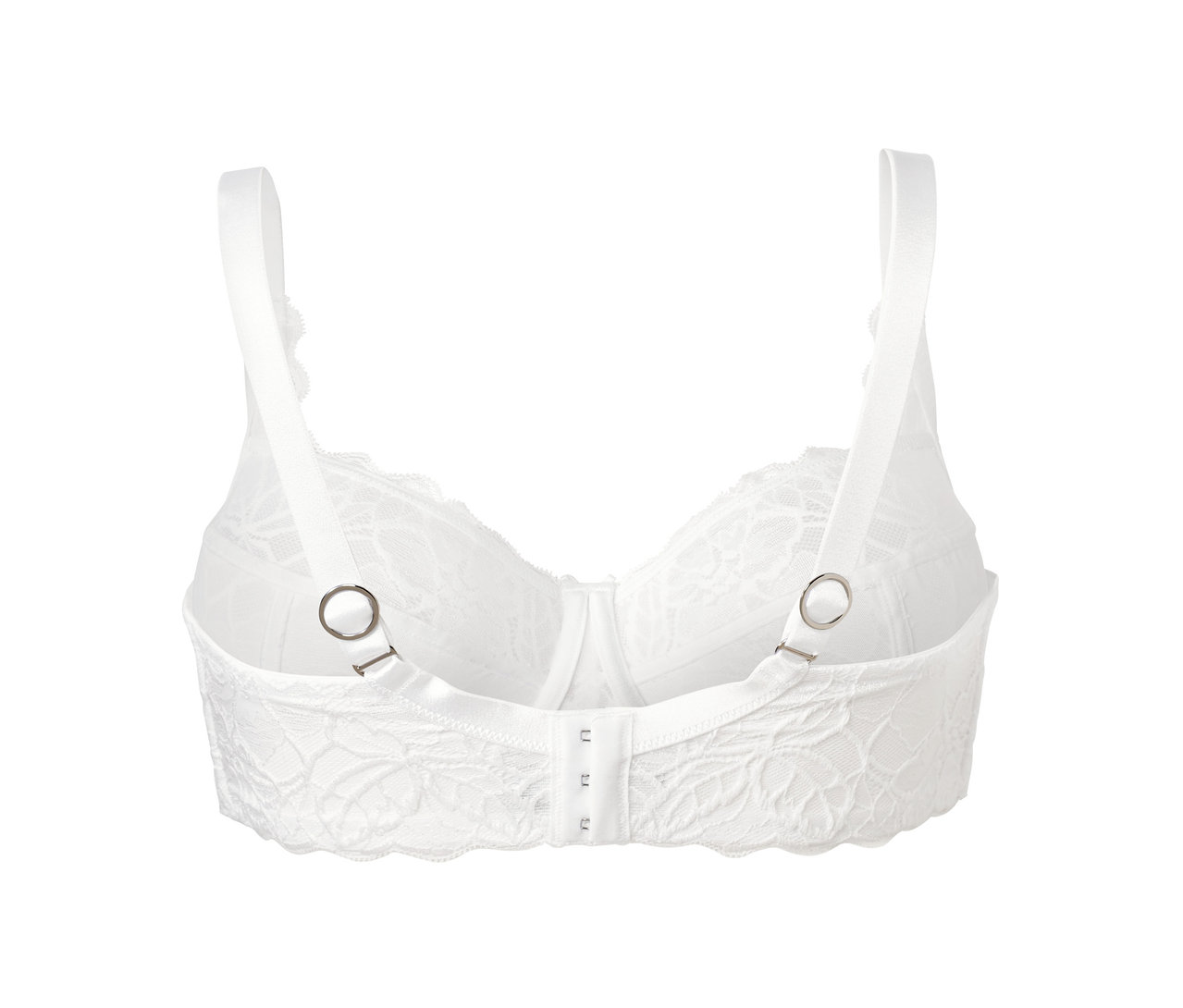Szczegółowy widok białego koronkowego biustonosza z fiszbinami i regulowanymi ramiączkami.