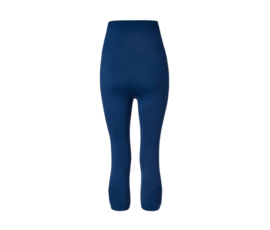 Ciemnoniebieskie damskie legginsy sportowe bezszwowe o długości 3/4.