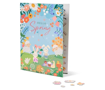 Ilustracja książki zatytułowanej "Hello Spring" z owcami, królikami, kwiatami i kocem piknikowym.