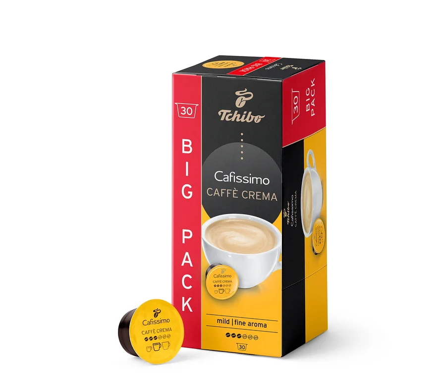 Opakowanie 30 kapsułek Caffè Crema Mild. Pudełko jest czerwono-czarno-żółte. Obok opakowania leży kapsułka.