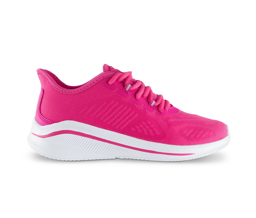 Różowy but typu sneakers z białą podeszwą.