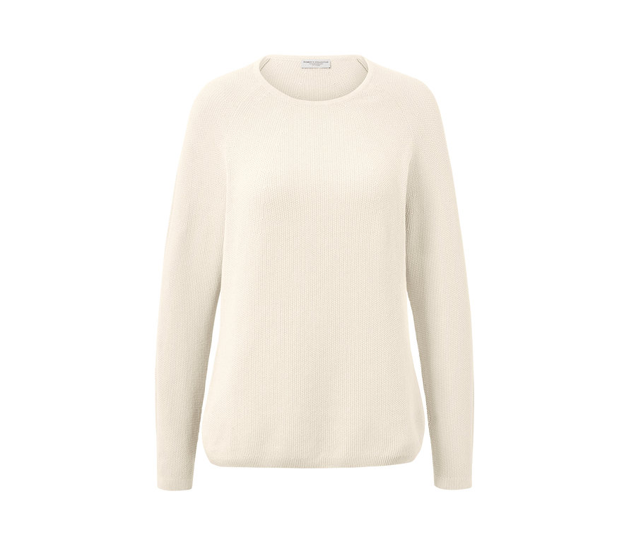 Kremowy sweter z dzianiny.