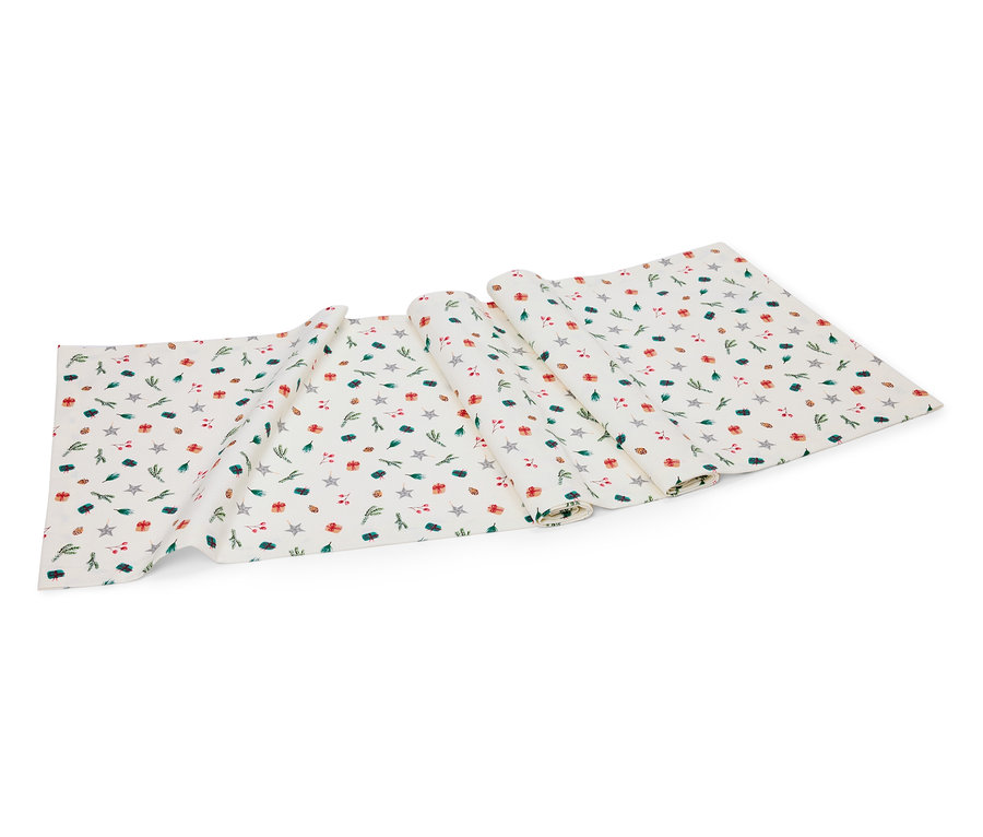 Biały bieżnik ze wzorem gwiazd, prezentów i gałązek.