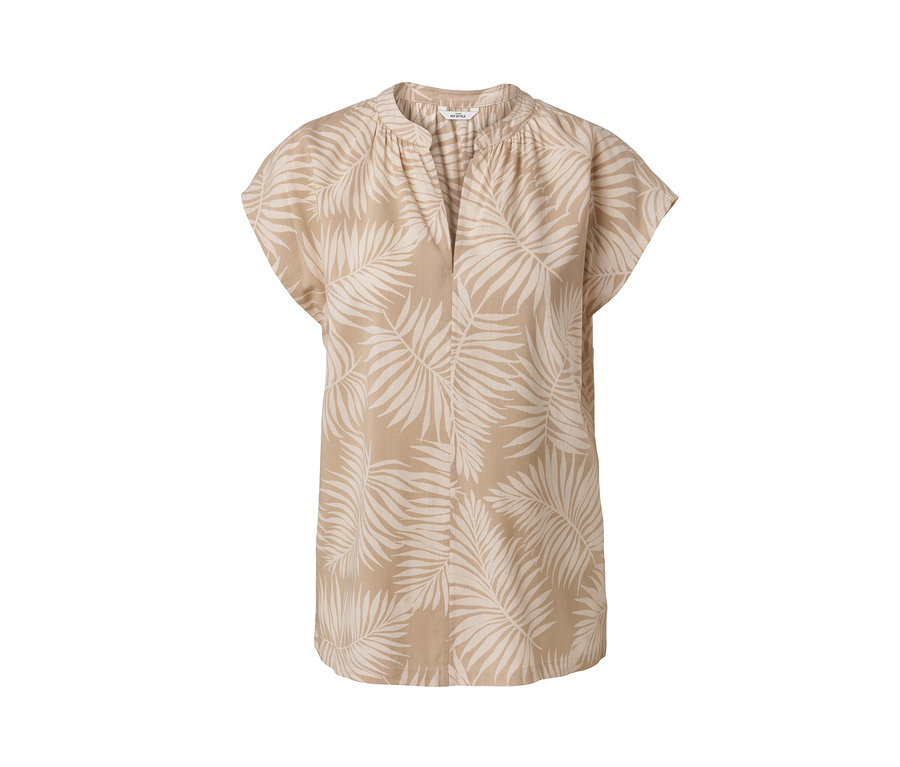 Beżowa bluzka z krótkim rękawem we wzór z liści.