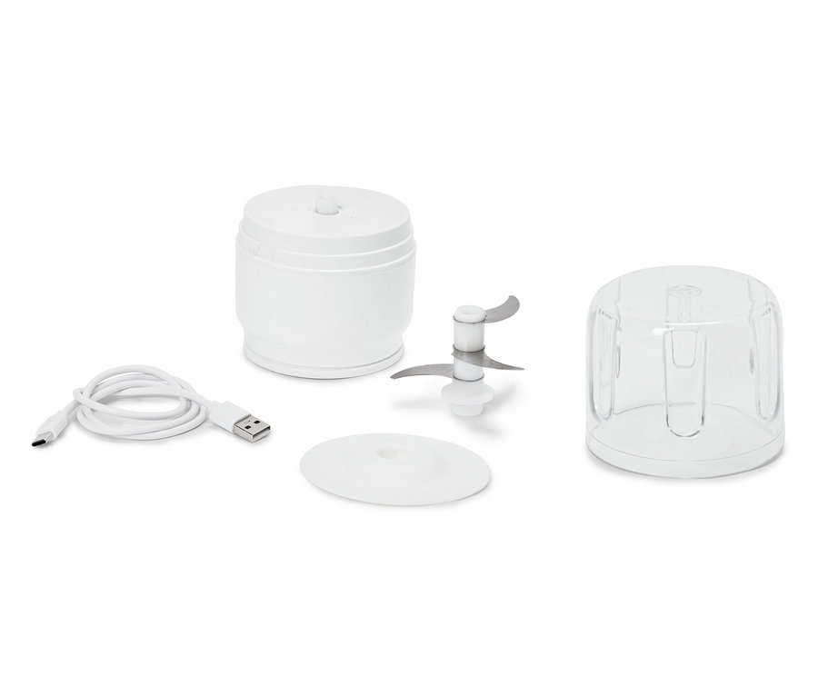 Części białego mini rozdrabniacza, w tym pojemnik, pokrywka, ostrze, kabel USB i przezroczysta miska.