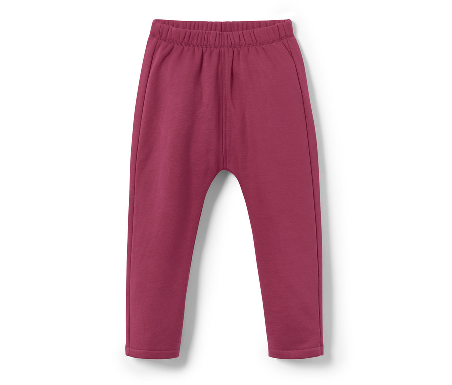 Fioletowe spodnie dresowe dla niemowląt, tęcza, na białym tle.