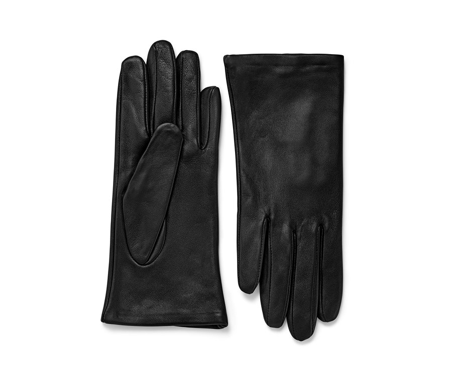 Dwie czarne rękawiczki skórzane.