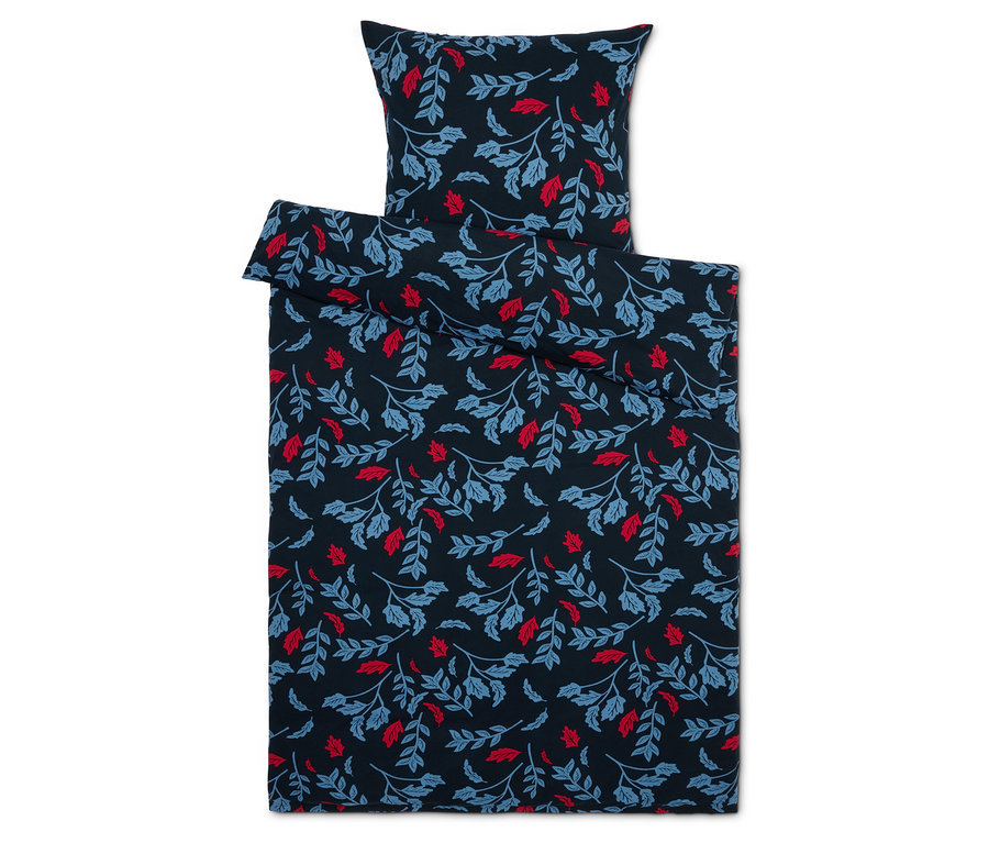 Pościel z niebieskimi i czerwonymi liśćmi na ciemnoniebieskim tle.