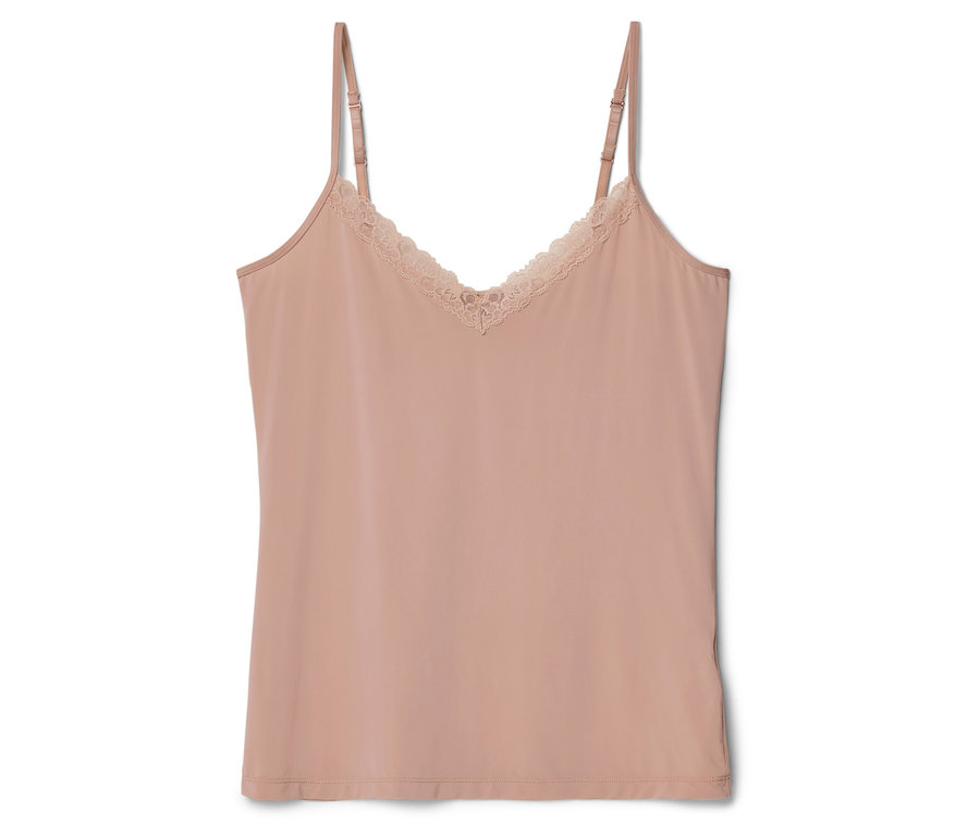 Różowy top na ramiączkach z koronką leży na białym tle.