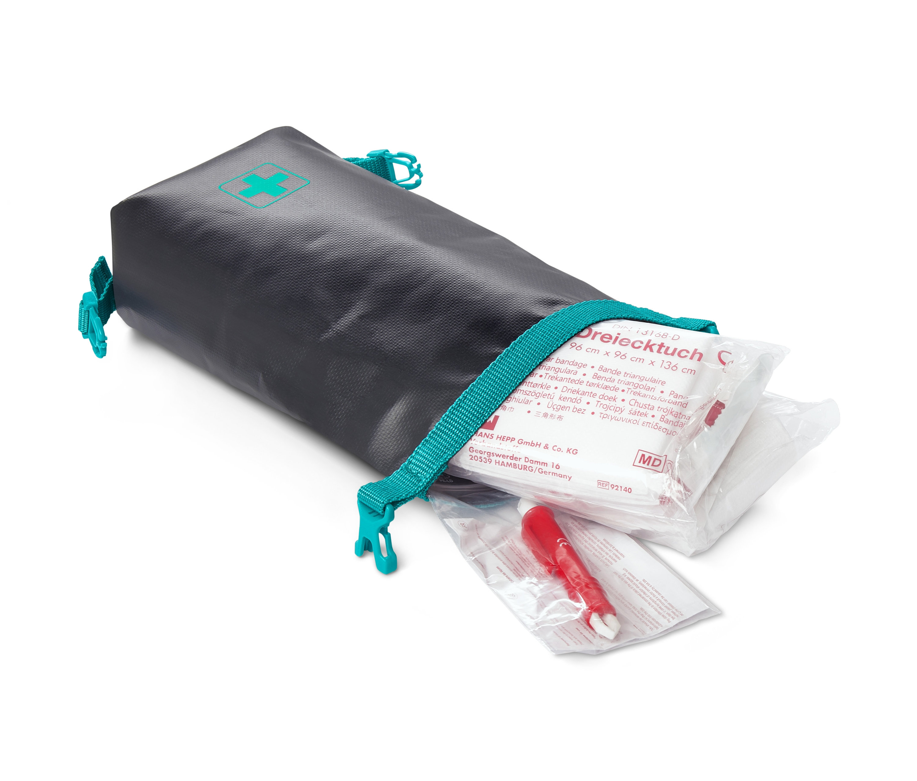 Otwarta apteczka pierwszej pomocy z zawartością.