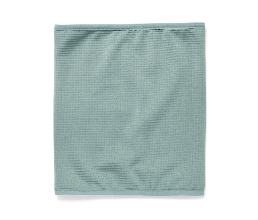 Jasnozielony dziecięcy komin wielofunkcyjny.