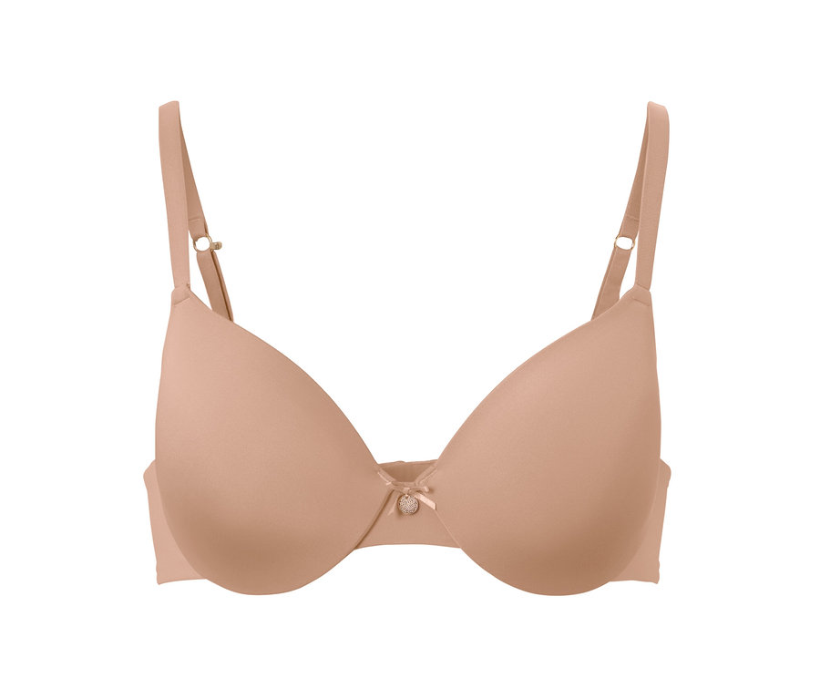 Beżowy biustonosz typu T-shirt z kokardką pośrodku.