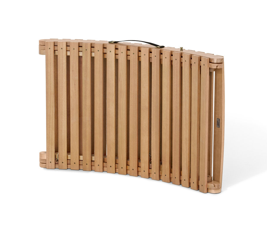 Złożony składany leżak falisty »Lenja« z poduszką.