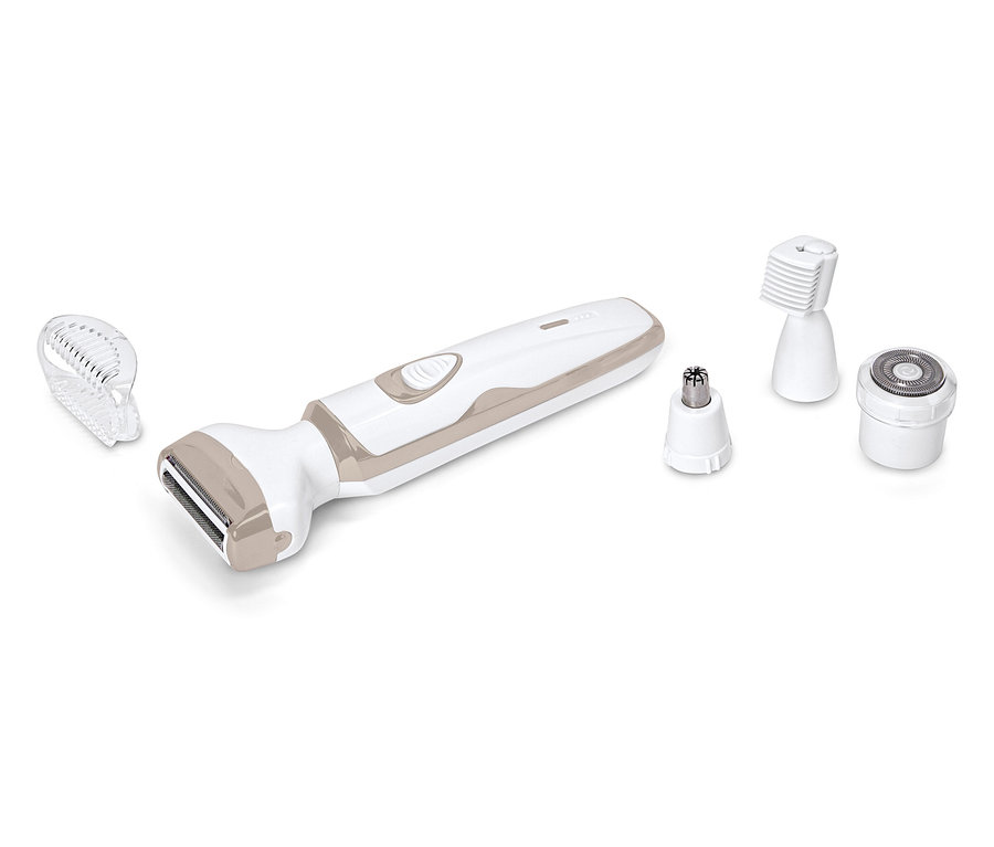 Biały i beżowy trymer do włosów leży z różnymi nasadkami na białym tle.