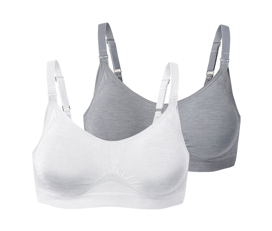 Dwa bezszwowe biustonosze do karmienia, jeden biały i jeden szary, z białymi ramiączkami.