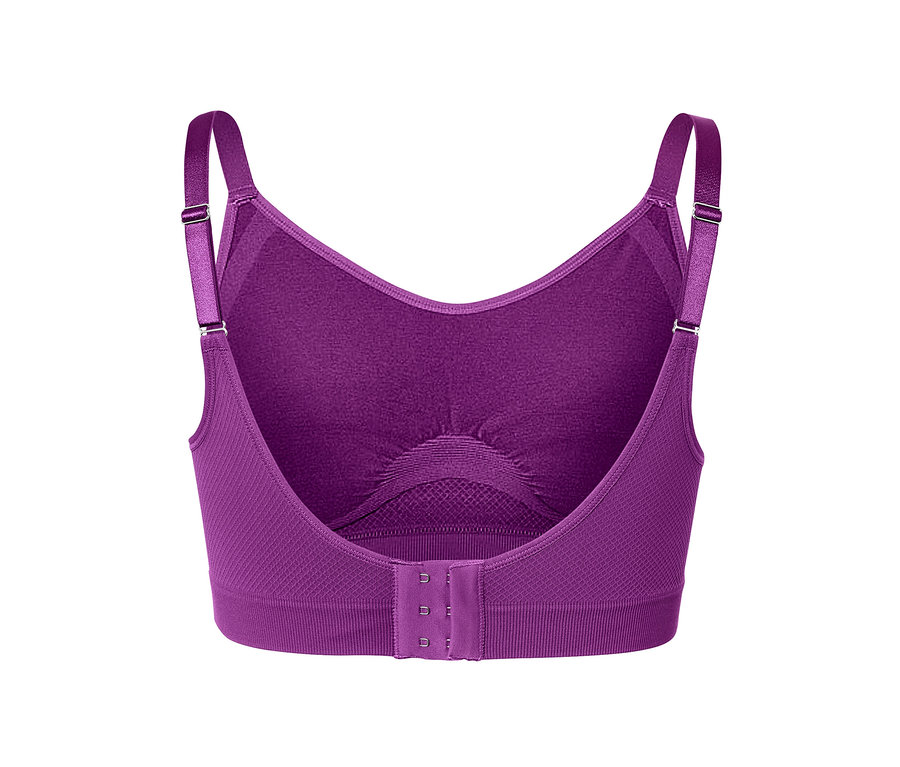 Zbliżenie na tył bezszwowego biustonosza sportowego w kolorze malinowym, zapinanego na trzy haftki.
