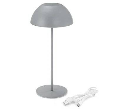 Szara lampa ze złączem USB na białym tle.