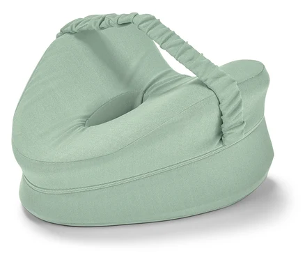Ergonomiczna poduszka pod kolana dla osób śpiących na boku, jasnozielona, z otworem i paskiem.