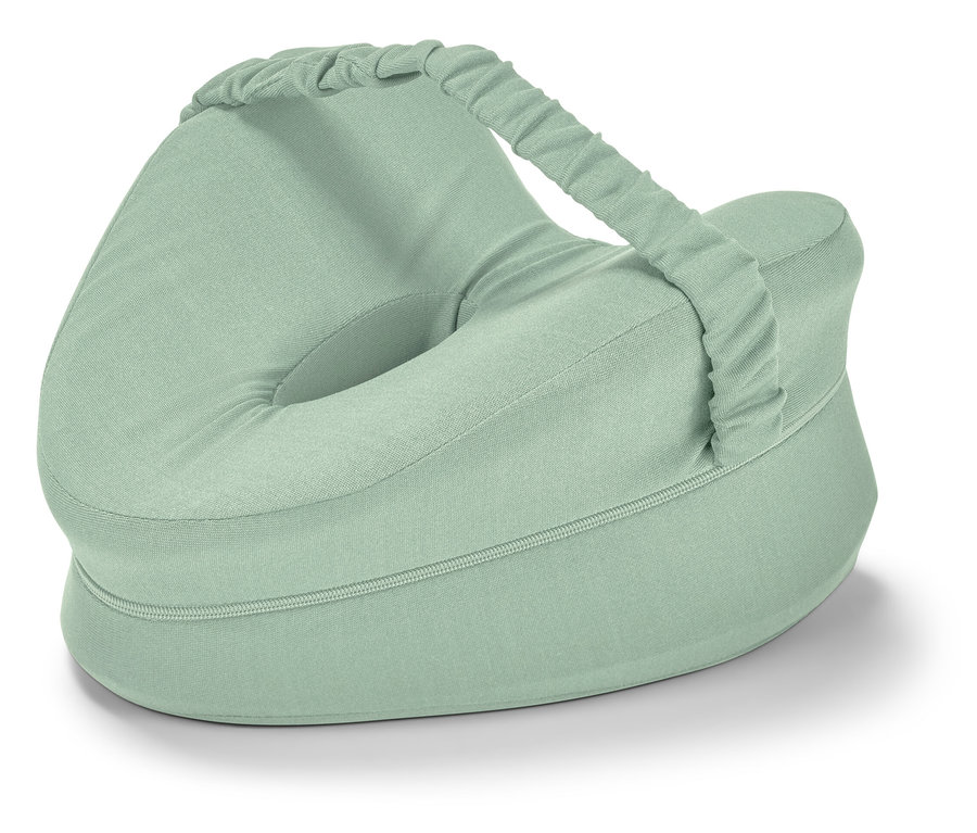 Ergonomiczna poduszka pod kolana dla osób śpiących na boku, jasnozielona, z otworem i paskiem.