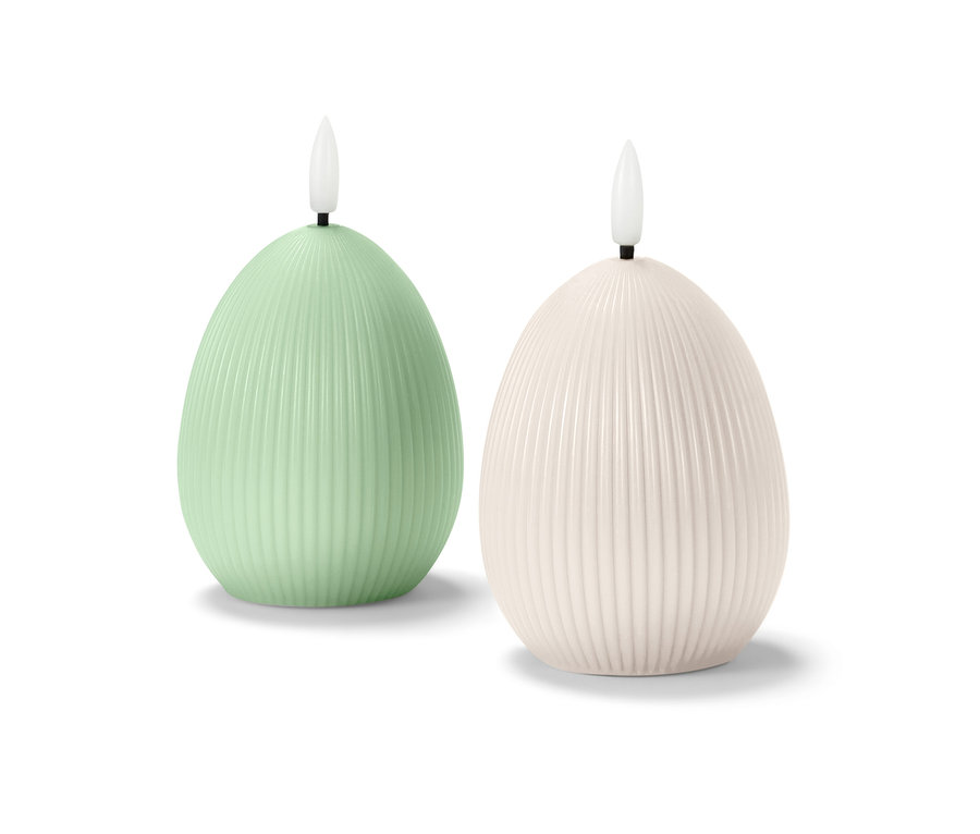 Dwie świece LED z prawdziwego wosku w kształcie jajka.