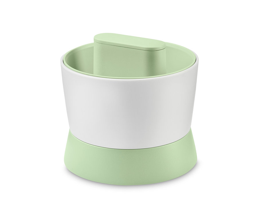 Rozdrabniacz do warzyw z jasnozieloną podstawą i białym środkiem.