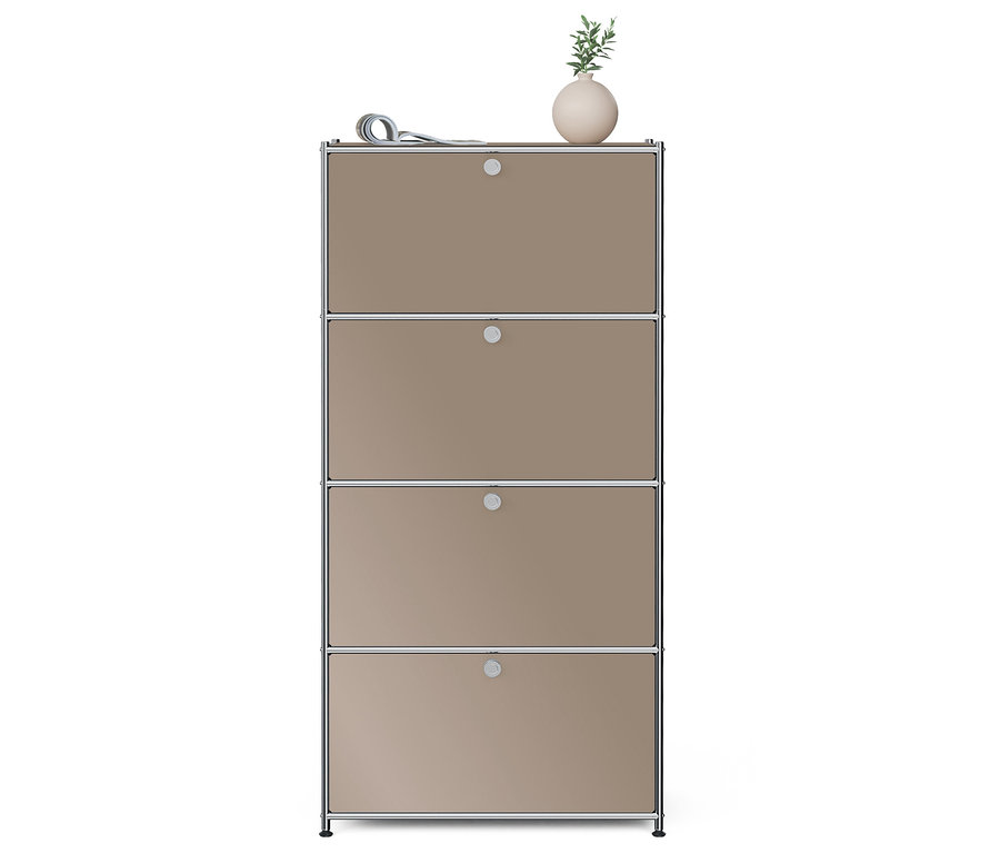 Czteropiętrowa szafka z kwiatem i gazetą na górze.