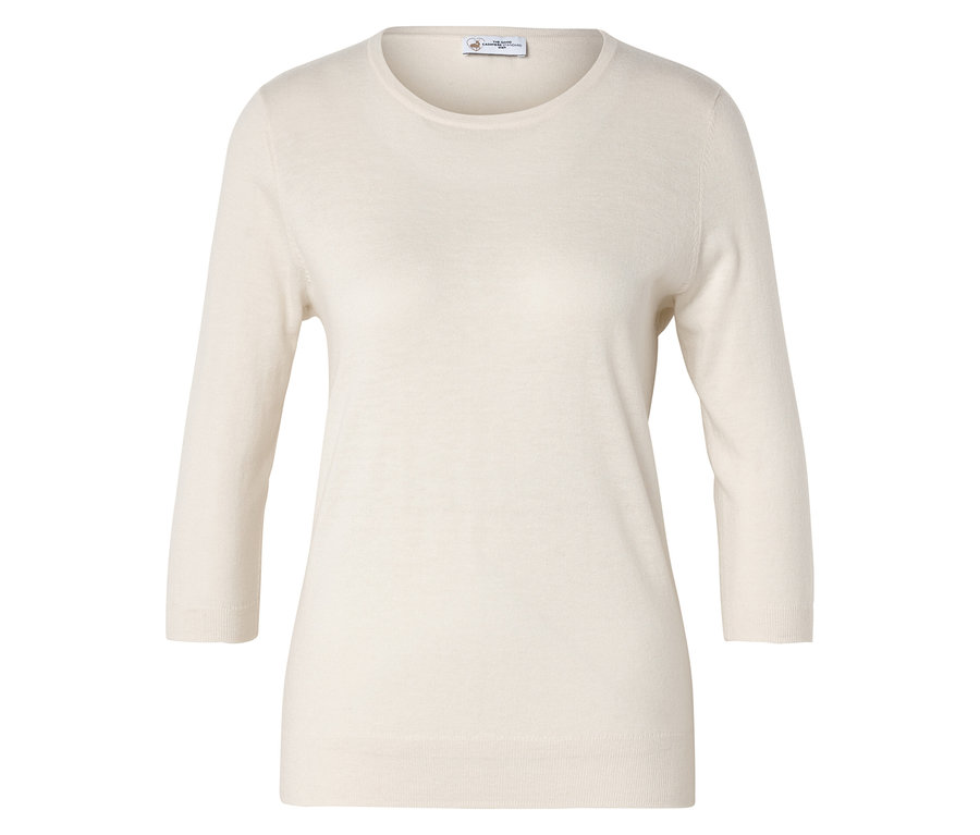 Kremowy sweter z rękawami o długości trzech czwartych leży płasko.