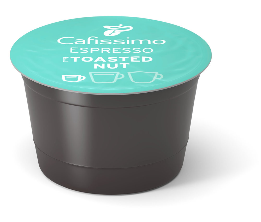 Kapsułka Cafissimo Flavoured Espresso - Toasted Nut leży na białym tle.